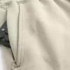 Pantalones deportivos holgados con cintura ceñida Pantalones deportivos holgados con cintura ceñida