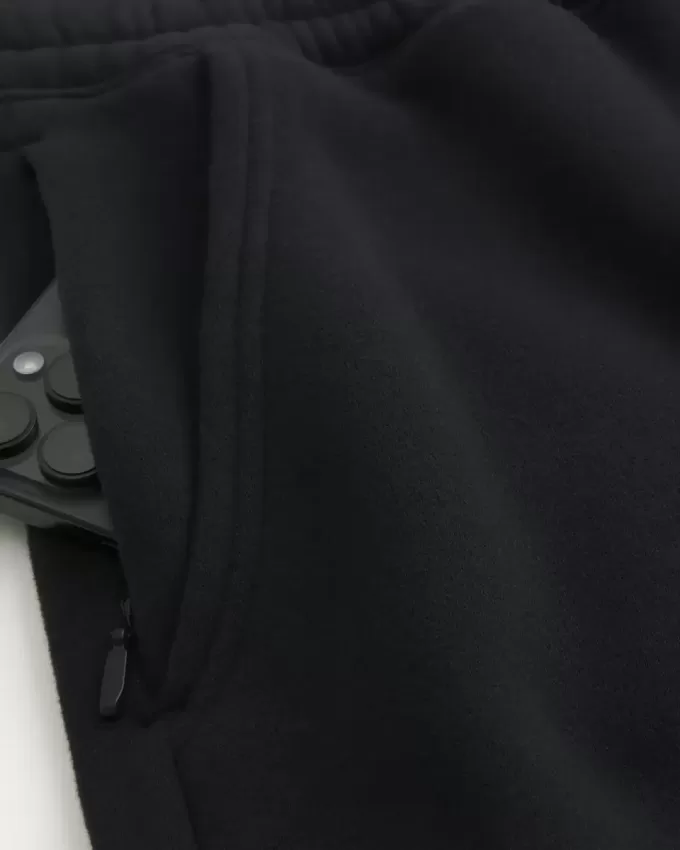 Pantalones deportivos holgados con cintura ceñida Pantalones deportivos holgados con cintura ceñida