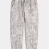 Pantalones deportivos holgados con cintura ceñida Pantalones deportivos holgados con cintura ceñida