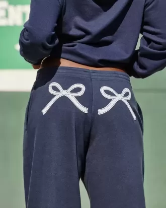 Pantalones deportivos holgados con estampado de lazo