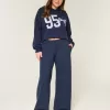 Pantalones deportivos holgados con estampado de lazo Pantalones deportivos holgados con estampado de lazo