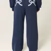 Pantalones deportivos holgados con estampado de lazo Pantalones deportivos holgados con estampado de lazo