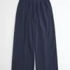 Pantalones deportivos holgados con estampado de lazo Pantalones deportivos holgados con estampado de lazo