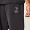 Pantalones deportivos holgados con estampado de serpiente Pantalones deportivos holgados con estampado de serpiente