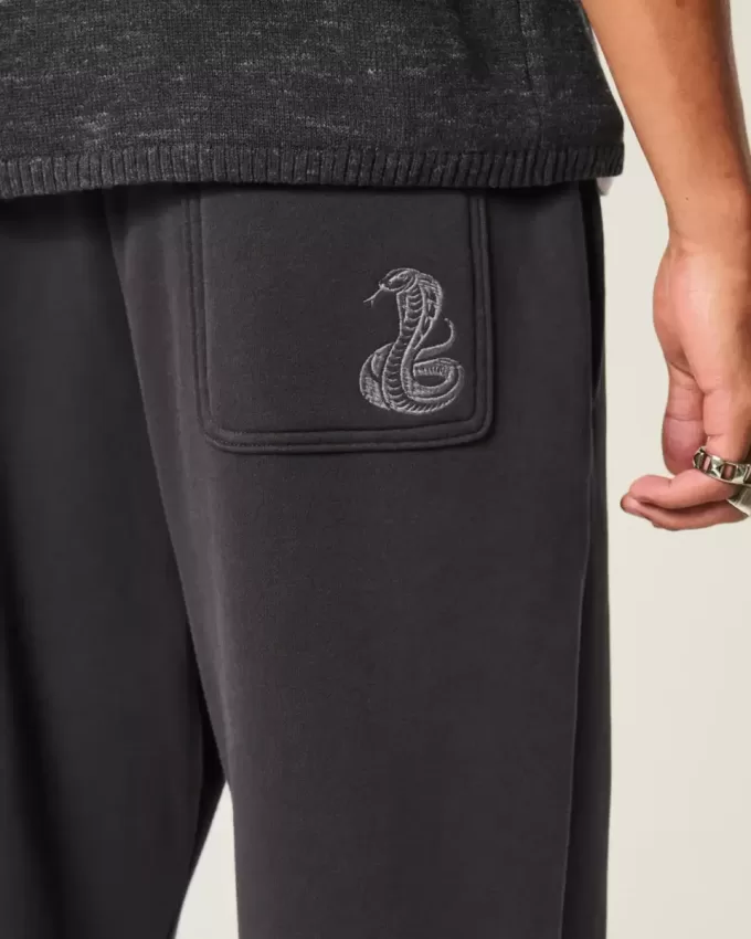 Pantalones deportivos holgados con estampado de serpiente Pantalones deportivos holgados con estampado de serpiente