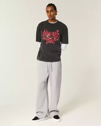 Pantalones deportivos holgados con gráfico de bolsillo trasero de Los Ángeles