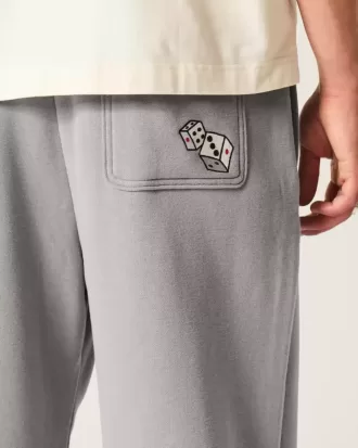 Pantalones deportivos holgados con gráficos de dados