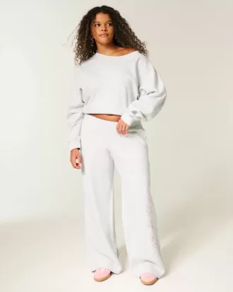 Pantalones deportivos holgados con gráficos de la clase del 26