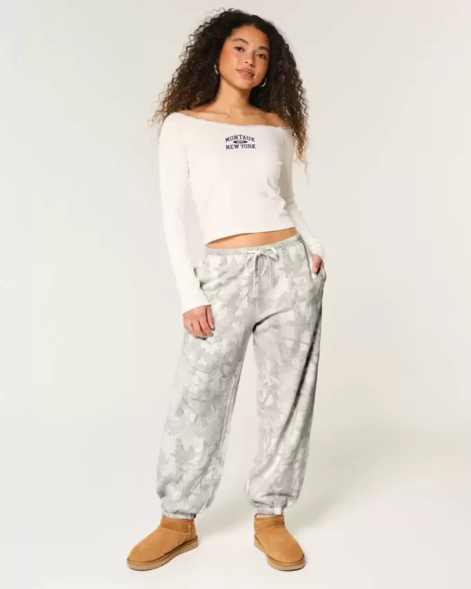Pantalones deportivos holgados de polar con estampado de camuflaje Pantalones deportivos holgados de polar con estampado de camuflaje