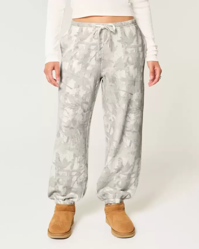 Pantalones deportivos holgados de polar con estampado de camuflaje Pantalones deportivos holgados de polar con estampado de camuflaje