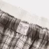 Pantalones holgados de franela Pantalones holgados de franela