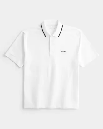 Polo con logotipo relajado
