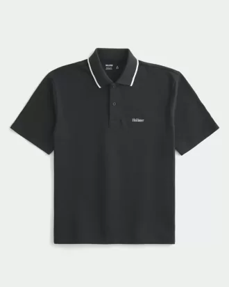 Polo con logotipo relajado