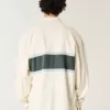 Polo de rugby cuadrado y pesado con gráfico del demonio de Tasmania Polo de rugby cuadrado y pesado con gráfico del demonio de Tasmania