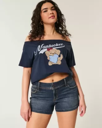 Shorts cortos de mezclilla con lavado oscuro y tiro bajo con curvas