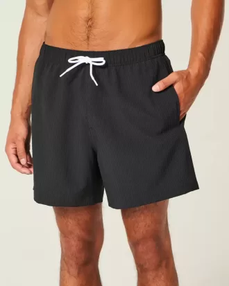 Shorts de baño de seersucker hasta la mitad del muslo
