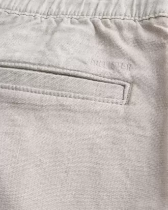Shorts de lino a la rodilla con parte delantera plana