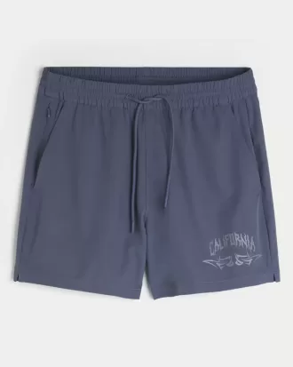 Shorts deportivos con gráficos a medio muslo