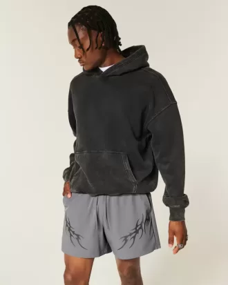 Shorts deportivos con gráficos a medio muslo