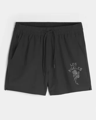 Shorts deportivos con gráficos a medio muslo