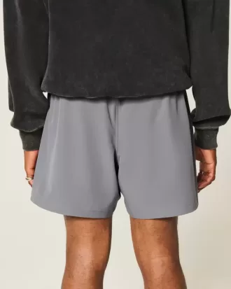 Shorts deportivos con gráficos a medio muslo