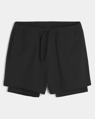 Shorts híbridos activos hasta la mitad del muslo