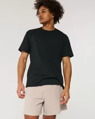 Shorts híbridos activos hasta la mitad del muslo