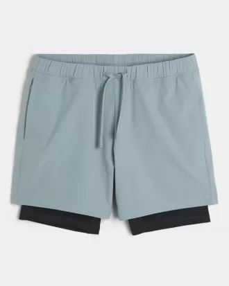 Shorts híbridos activos hasta la mitad del muslo