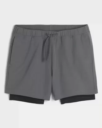 Shorts híbridos activos hasta la mitad del muslo