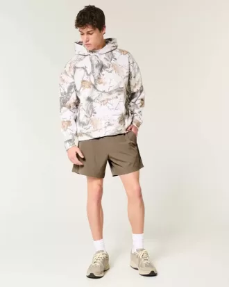 Shorts híbridos activos hasta la mitad del muslo