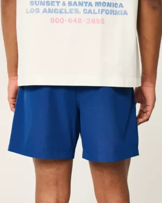 Shorts híbridos activos hasta la mitad del muslo