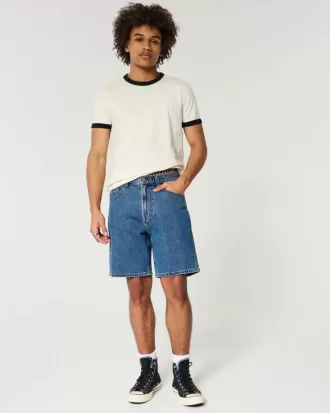 Shorts vaqueros holgados por encima de la rodilla