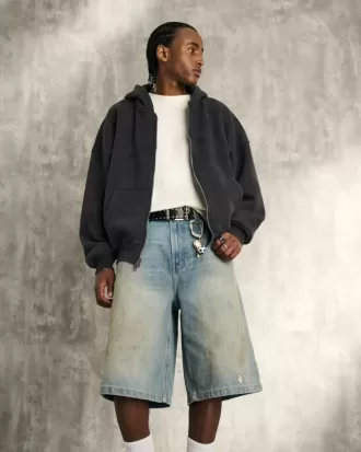 Shorts vaqueros super holgados con lavado medio engrasado