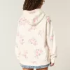 Sudadera con capucha extragrande con estampado floral Feel Good de Hollister Sudadera con capucha extragrande con estampado floral Feel Good de Hollister