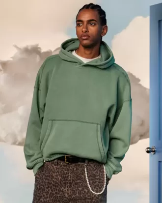 Sudadera con capucha holgada y cintura ajustada