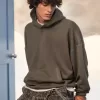 Sudadera con capucha holgada y cintura ajustada Sudadera con capucha holgada y cintura ajustada