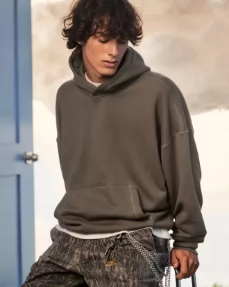 Sudadera con capucha holgada y cintura ajustada