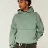 Sudadera con capucha holgada y cintura ajustada Sudadera con capucha holgada y cintura ajustada