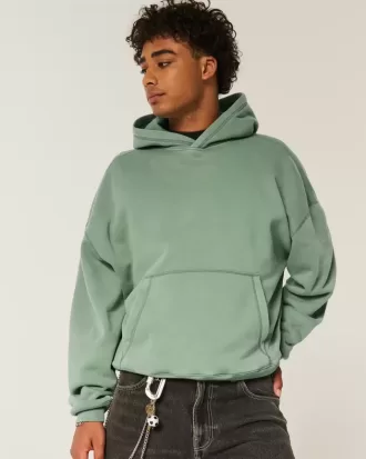 Sudadera con capucha holgada y cintura ajustada