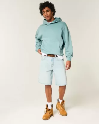 Sudadera con capucha holgada y cintura ajustada