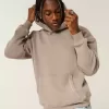 Sudadera con capucha y costuras en contraste de estilo cuadrado Sudadera con capucha y costuras en contraste de estilo cuadrado