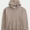 Sudadera con capucha y costuras en contraste de estilo cuadrado Sudadera con capucha y costuras en contraste de estilo cuadrado