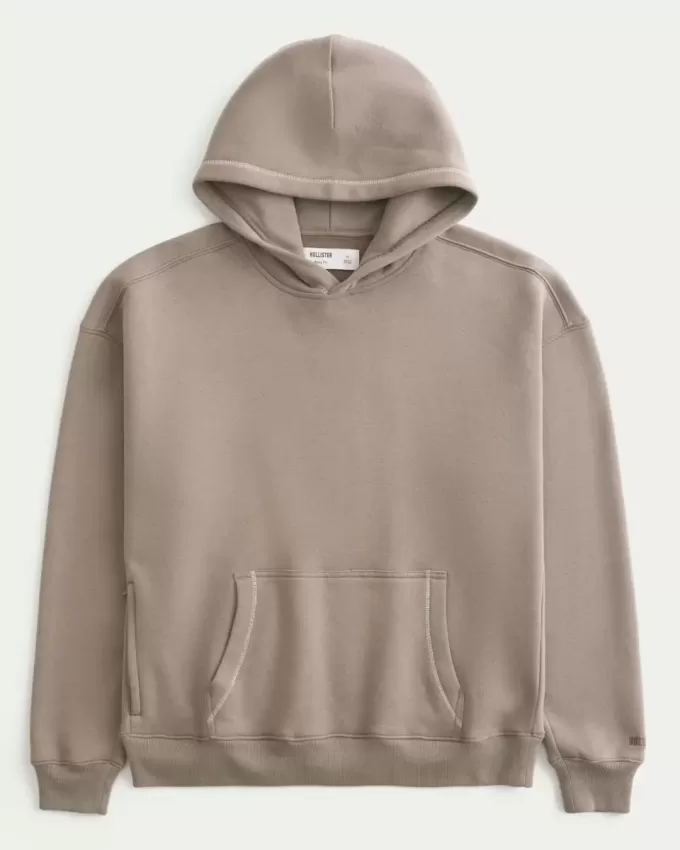 Sudadera con capucha y costuras en contraste de estilo cuadrado Sudadera con capucha y costuras en contraste de estilo cuadrado