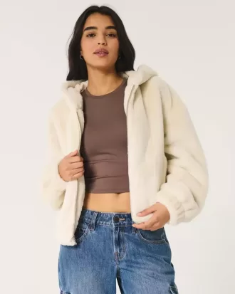 Sudadera con capucha y cremallera de piel sintética acogedora