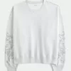 Sudadera con cuello redondo y gráfico con tachuelas Easy Sudadera con cuello redondo y gráfico con tachuelas Easy