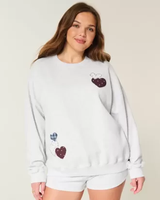 Sudadera con cuello redondo y gráfico de corazón de gran tamaño