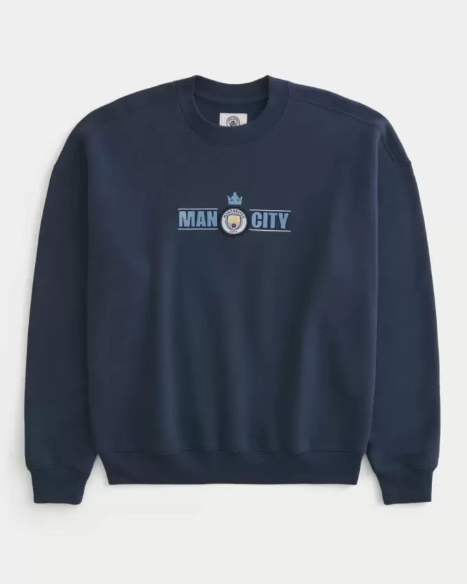 Sudadera con cuello redondo y gráfico del Manchester City FC Sudadera con cuello redondo y gráfico del Manchester City FC