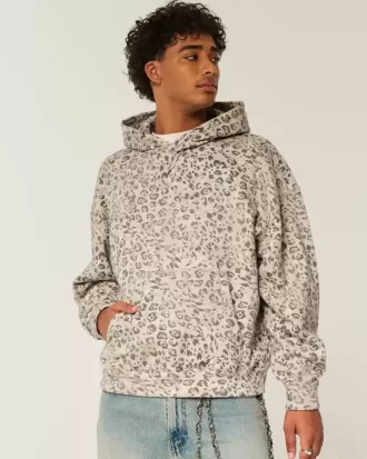 Sudadera holgada con capucha y estampado de leopardo