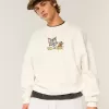Sudadera holgada con cuello redondo y estampado de Tom y Jerry