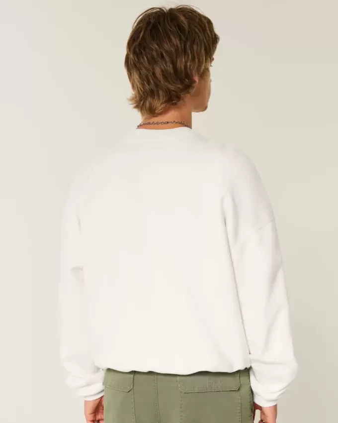 Sudadera holgada con cuello redondo y estampado Malibu Sudadera holgada con cuello redondo y estampado Malibu